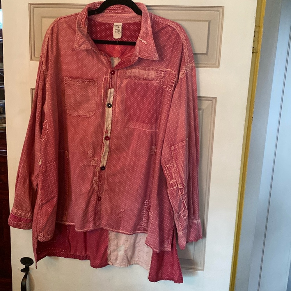 Fabulous red high low multi color button shirt.